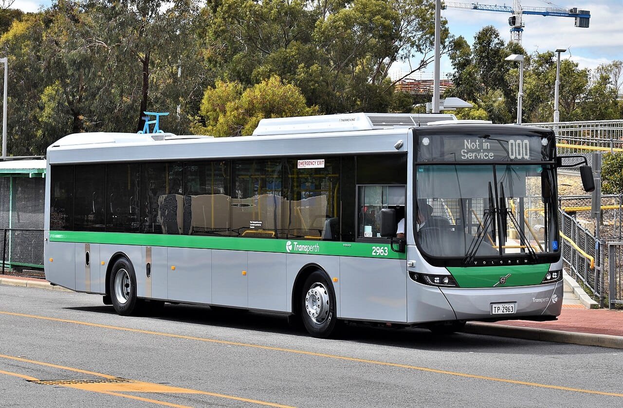 A city bus. Buses require no dedicated infrastructure, which makes them the most widely used mode and the most exposed to traffic congestion.