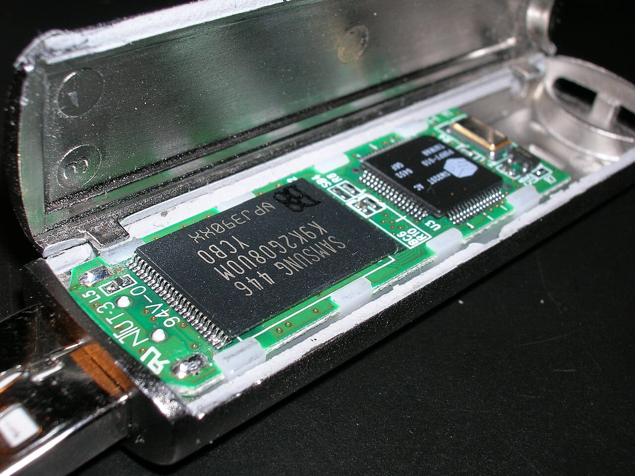 A USB flash drive. Writing and erasing its memory cells works by forcing electrons to tunnel through an insulating layer, which is also why flash memory has a finite number of write cycles.