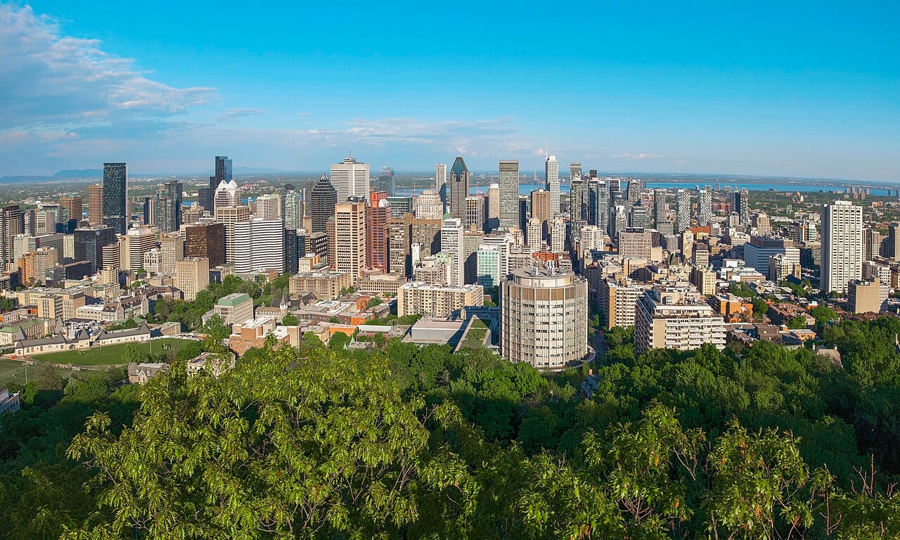 The skyline of Montreal, the largest city in Quebec and the second-largest in Canada. A vibrant, mostly French-speaking metropolis, it is the cultural and economic heart of the province.
