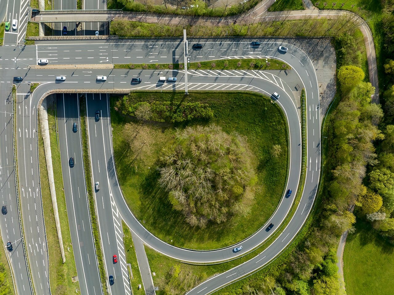 A modern grade-separated interchange. Capacity at junctions rather than on links is generally what limits an urban road network.