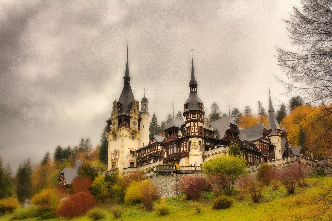 Peles Castle at Sinaia, a lavish royal residence set in the forested Carpathian Mountains. Built for King Carol the First, it captures both the grandeur of the old monarchy and the beauty of Romania's mountain heartland.