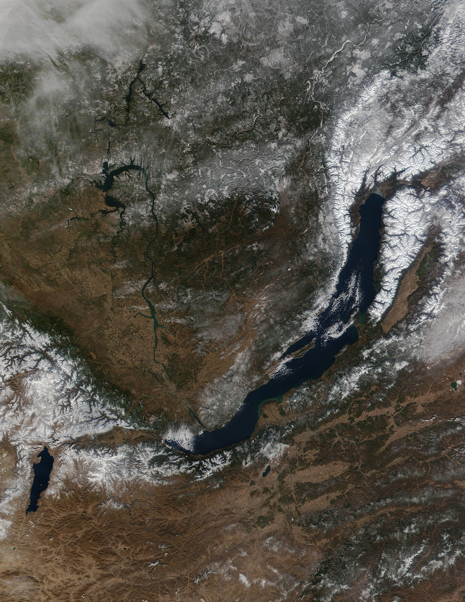 Lake Baikal in Siberia, the deepest and oldest freshwater lake on Earth. It holds about a fifth of the world's unfrozen fresh water and species found nowhere else.