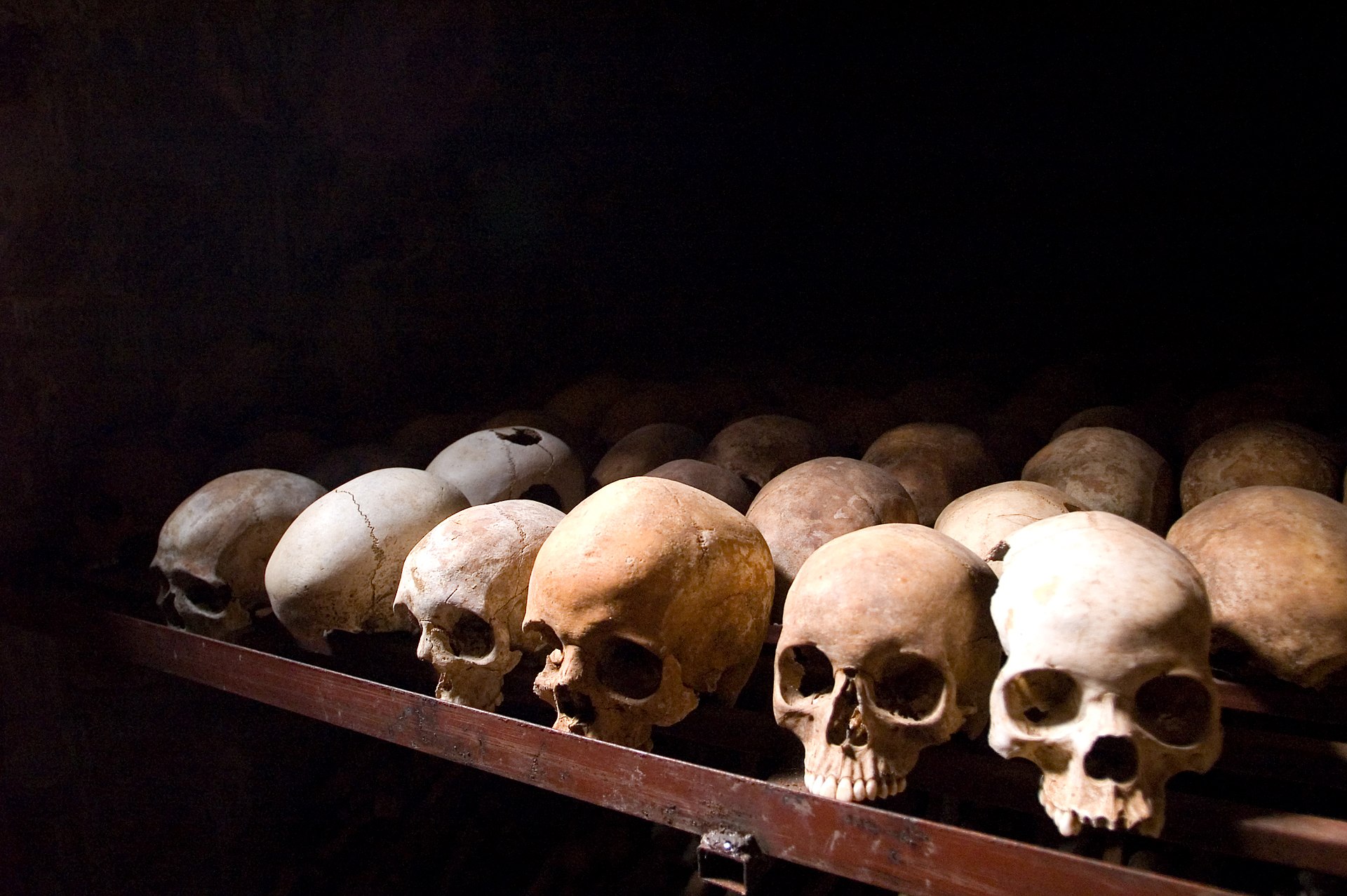 Skulls preserved at a genocide memorial, a solemn reminder of the mass killings of 1994. Credit: Fanny Schertzer (CC BY-SA 3.0).