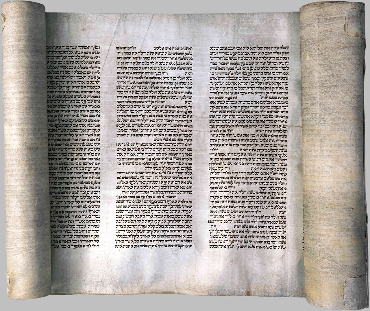 A Torah scroll. Scrolls for liturgical use are handwritten by trained scribes under detailed rules, and a single error renders a scroll unfit for use.