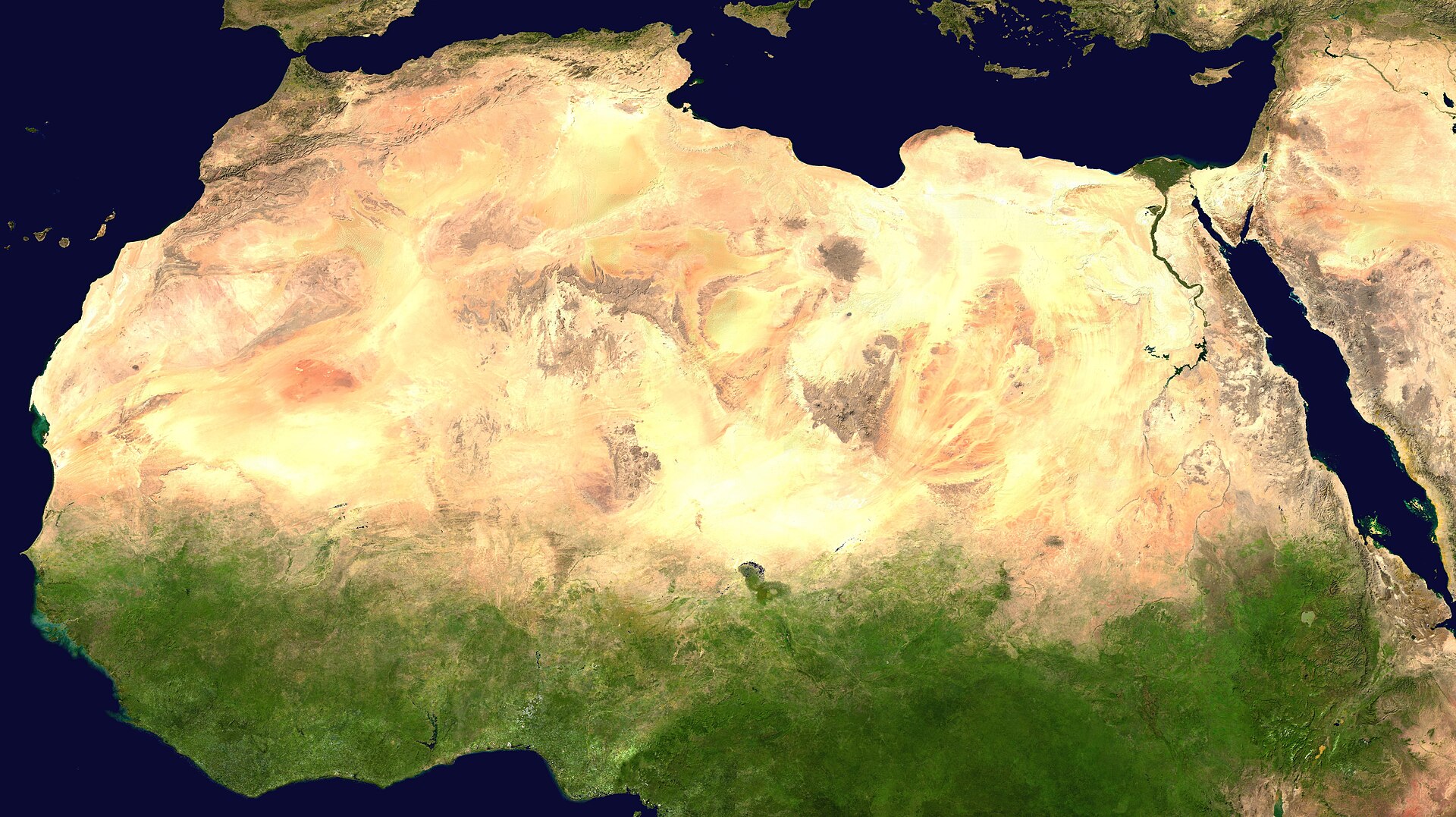 A satellite view of the Sahara, showing how much of it is rock and gravel rather than sand. Credit: NASA (Public domain).