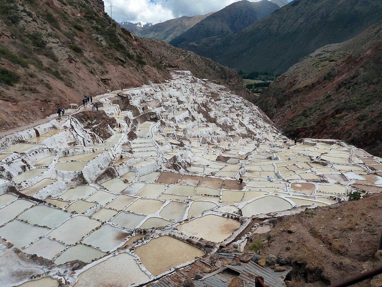 Evaporation pans at Maras in Peru, fed by a natural saline spring and worked for centuries. Solar evaporation is the oldest production method and remains the largest.
