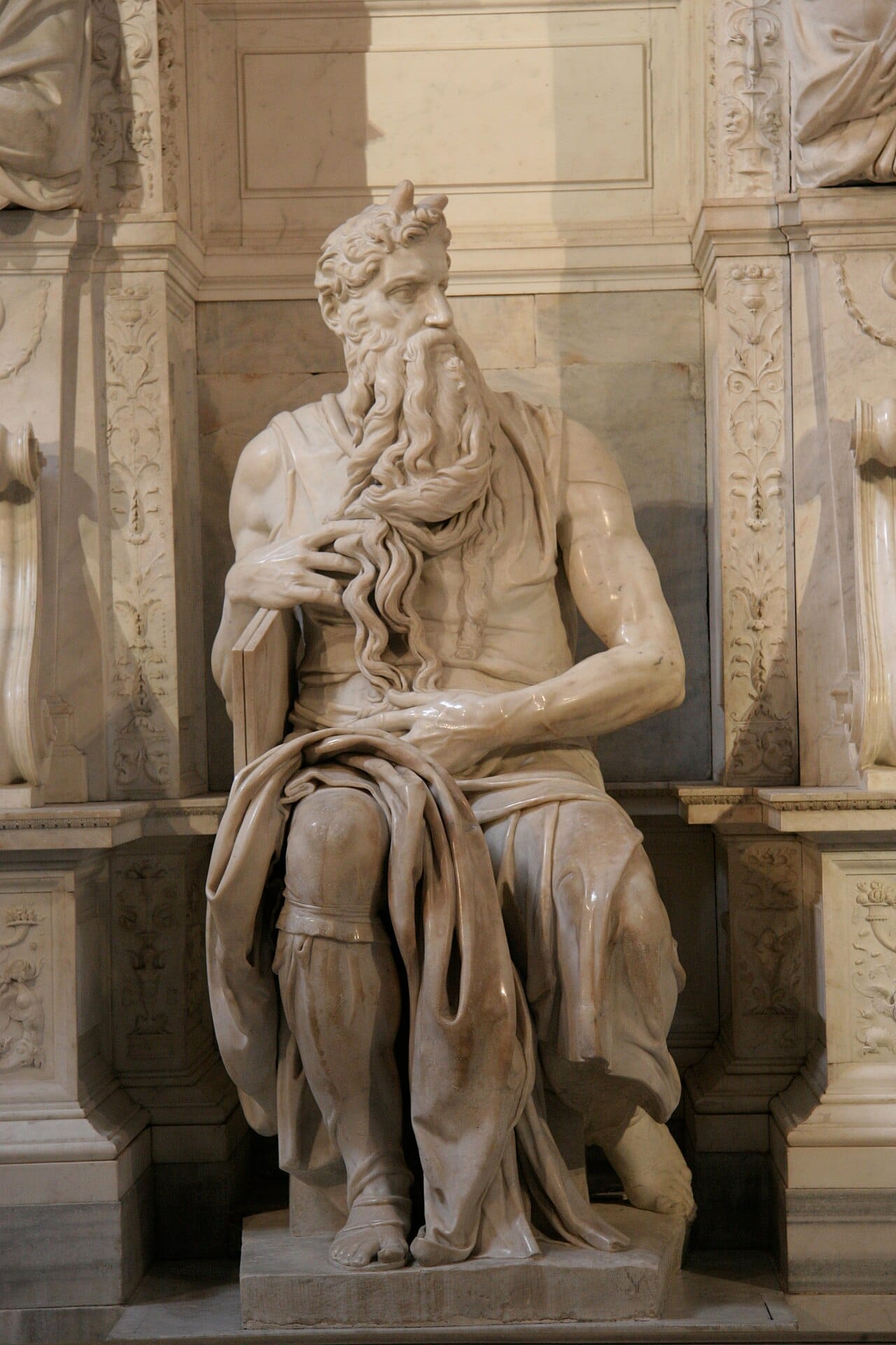 Michelangelo's Moses. Renaissance carving in marble aimed at anatomical accuracy and at the appearance of a figure emerging from the block.