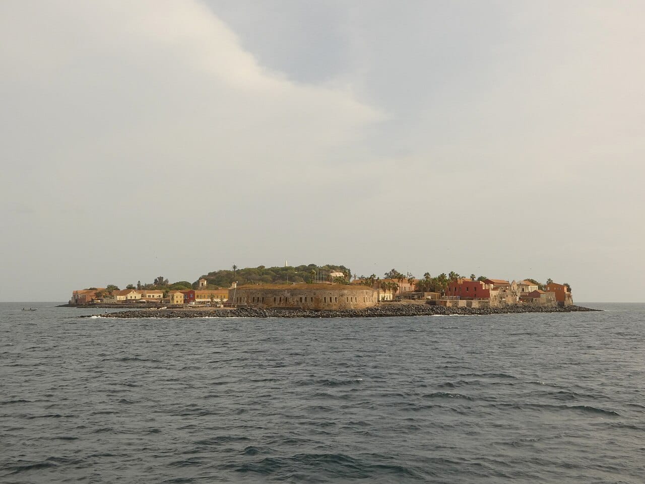 The island of Goree off the coast of Dakar. Once a hub of the Atlantic slave trade, its pastel colonial houses and the House of Slaves now stand as a World Heritage site and a place of pilgrimage and memory.