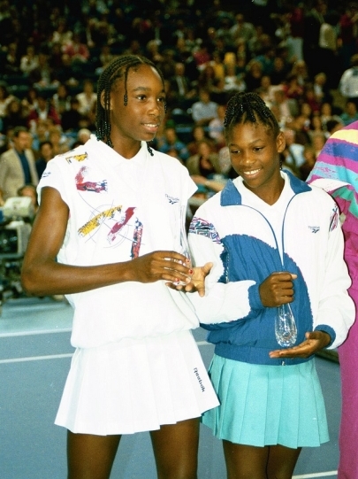 Serena (right) with her sister Venus as young players in 1993.