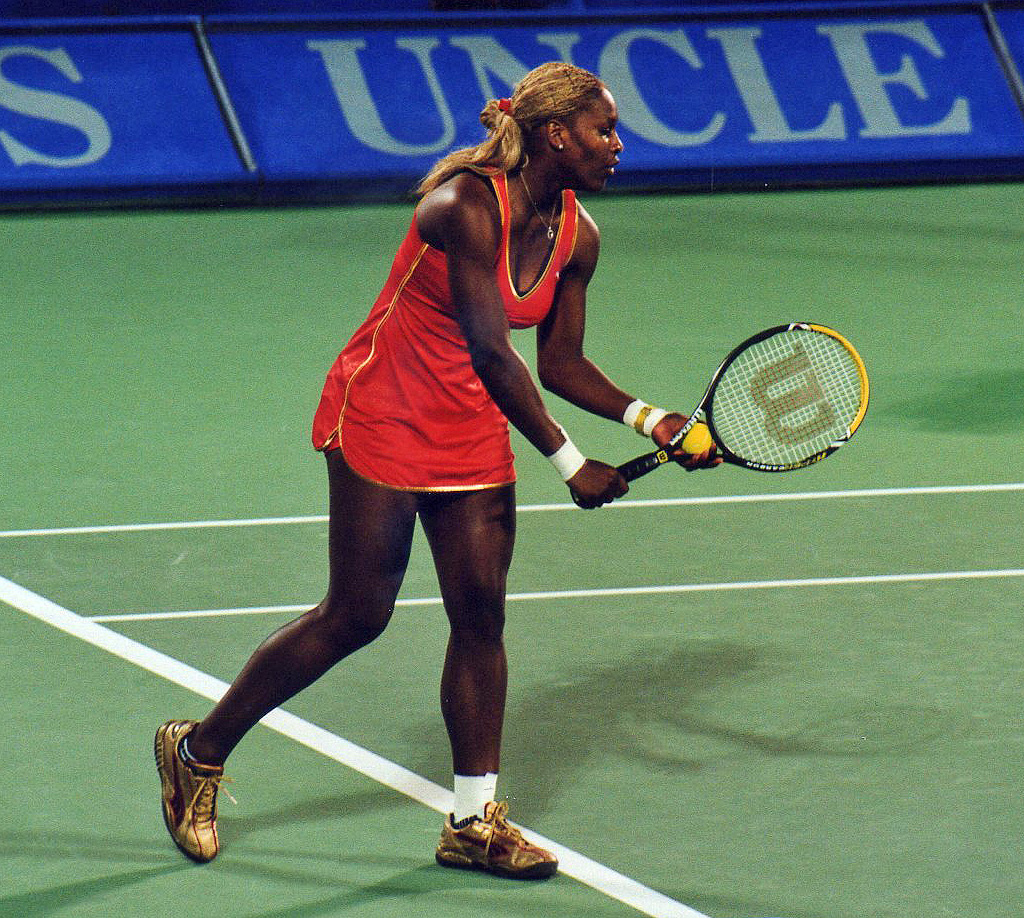 Serena Williams in action; her powerful game reshaped women's tennis.