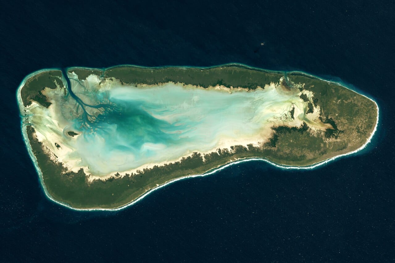 Aldabra atoll from orbit, one of the largest atolls in the world. A proposal to build a military airfield here in the 1960s was defeated by a scientific campaign, and it is now a World Heritage site.