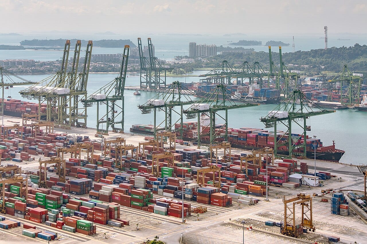 The Port of Singapore. Consistently among the world's busiest container ports and its largest ship-refuelling hub, the harbour is the reason the settlement was founded in 1819 and remains the physical foundation of the modern economy.