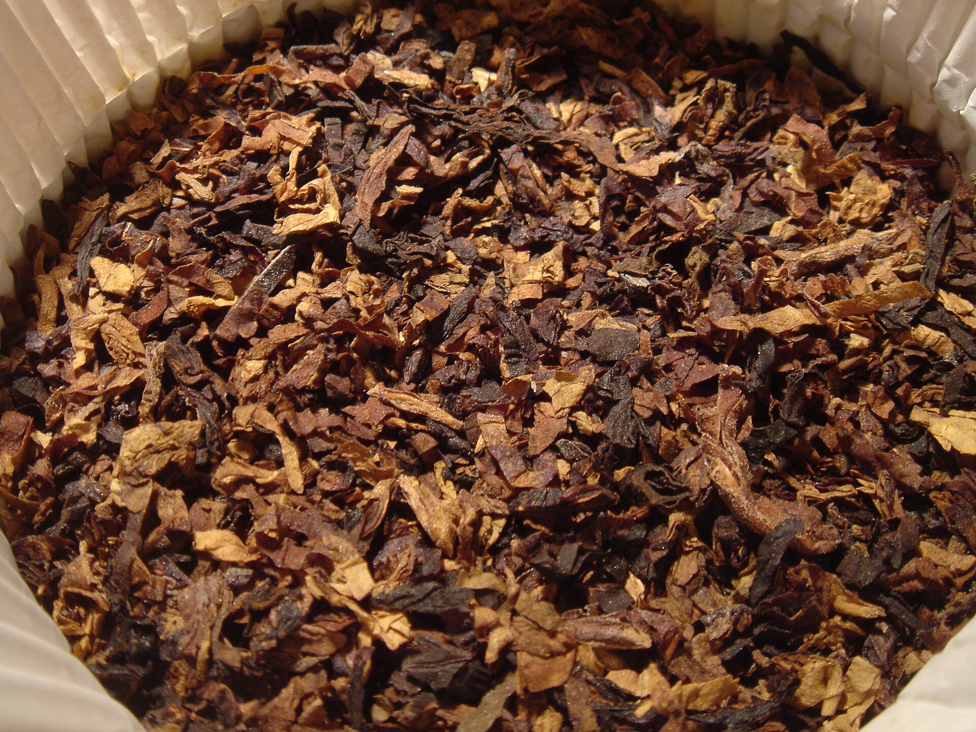 Mass produced tobacco products spread widely through the twentieth century.