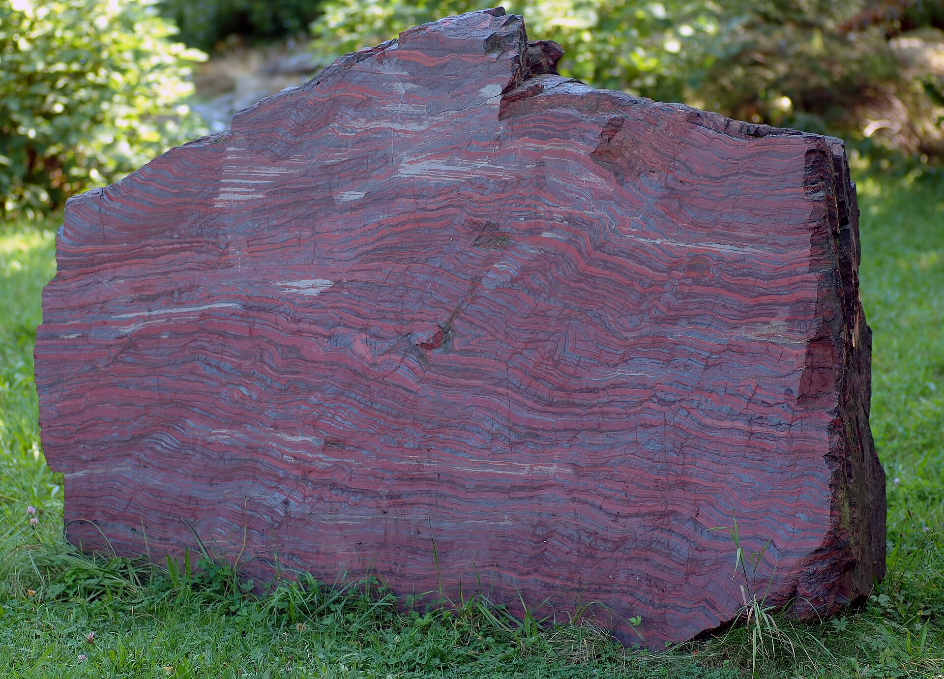 Banded iron formations, whose chemistry fits a world starved of oxygen under ice.