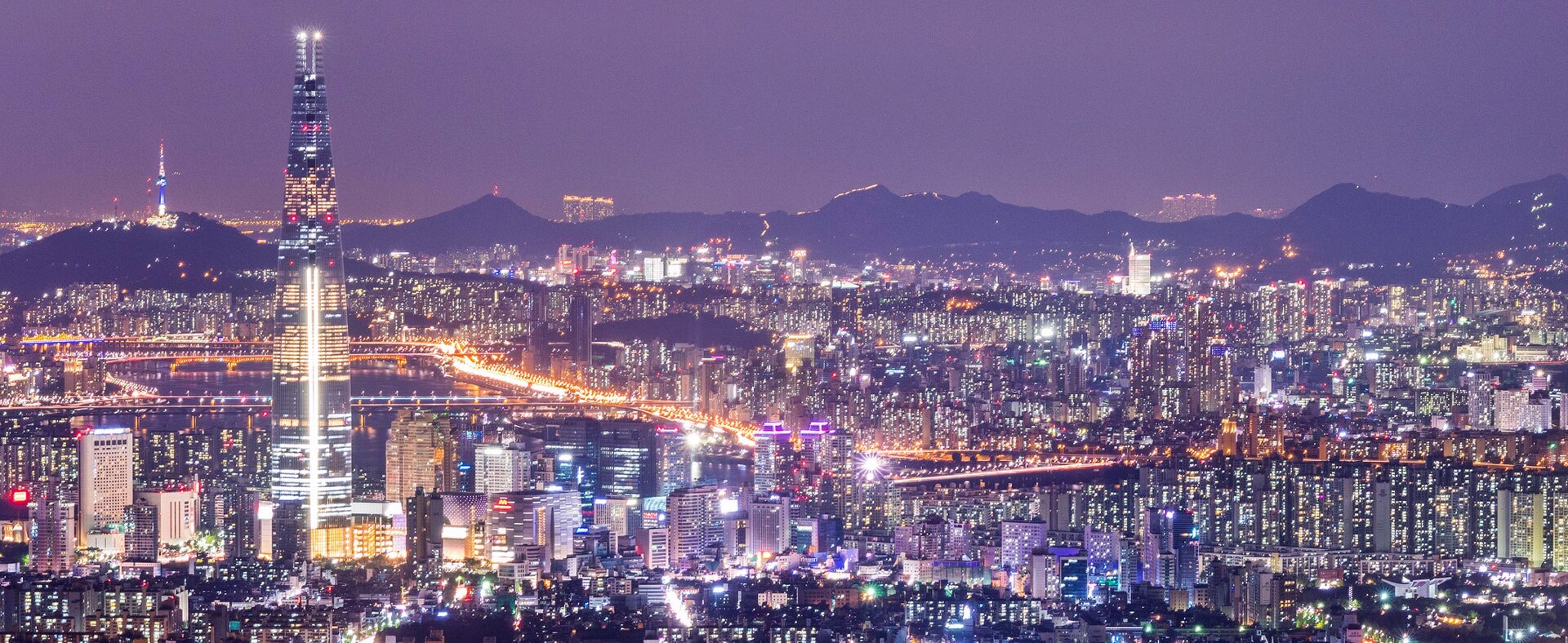 The skyline of Seoul. Home to roughly half the country's people, the capital is a global hub of business and technology and the centre of South Korea's cultural boom.