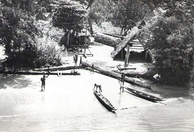 A Maroon village along the Suriname River. Descendants of enslaved Africans who escaped the plantations and fought for their freedom, the Maroons preserve African-rooted cultures in the forest interior, a living legacy found in few other places.