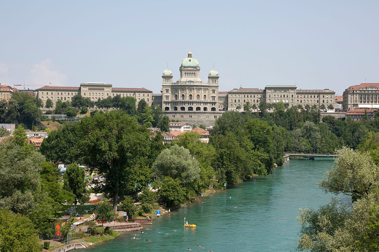 The Federal Palace in Bern, seat of the Swiss federal government and parliament. Bern is the capital, but power in Switzerland is deliberately spread among a seven-member council, the cantons, and the citizens who vote directly on the laws.