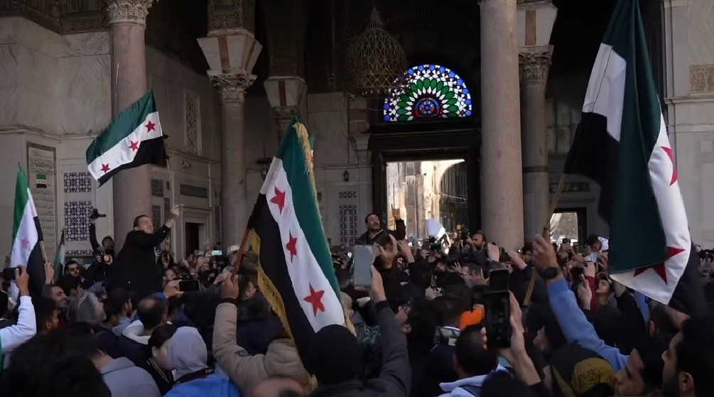 Crowds celebrating at the Umayyad Mosque in Damascus in December 2024, after opposition forces entered the capital and the Assad government fell. The moment ended more than half a century of one-family rule and opened an uncertain new chapter for Syria.