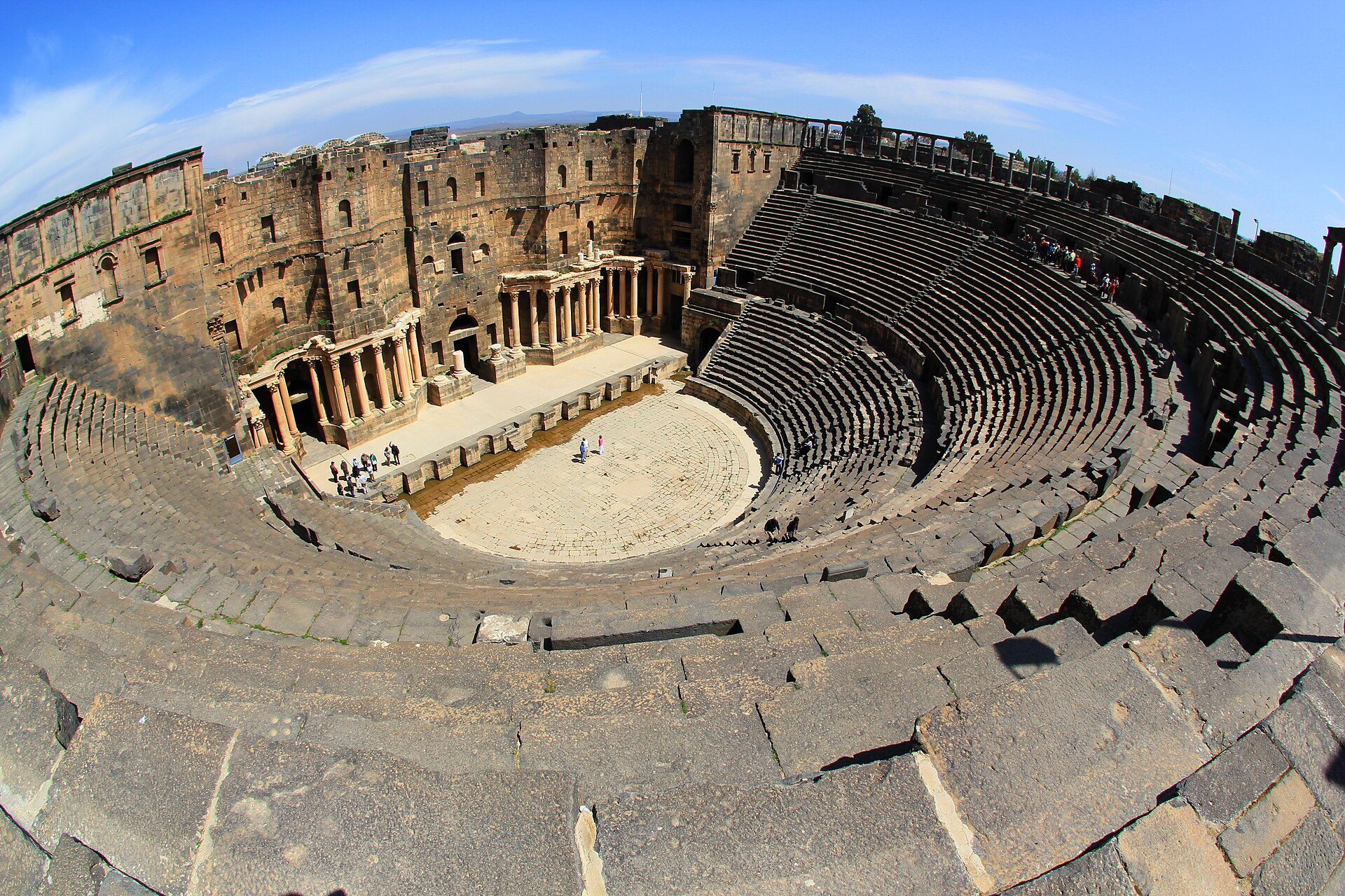 The well-preserved Roman theatre at Bosra, a reminder of Syria's deep classical heritage. Credit: (Ergo) (CC BY 2.0).