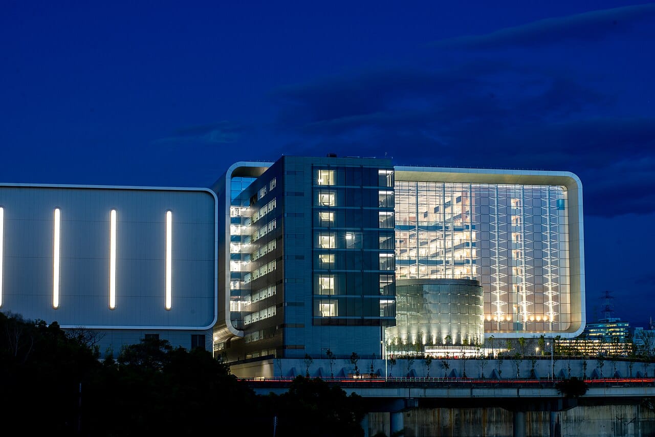 A TSMC research and development centre at night. Taiwan Semiconductor Manufacturing Company produces most of the world's most advanced chips, a concentration described both as a shield against invasion and as a strategic vulnerability for every country that depends on it.