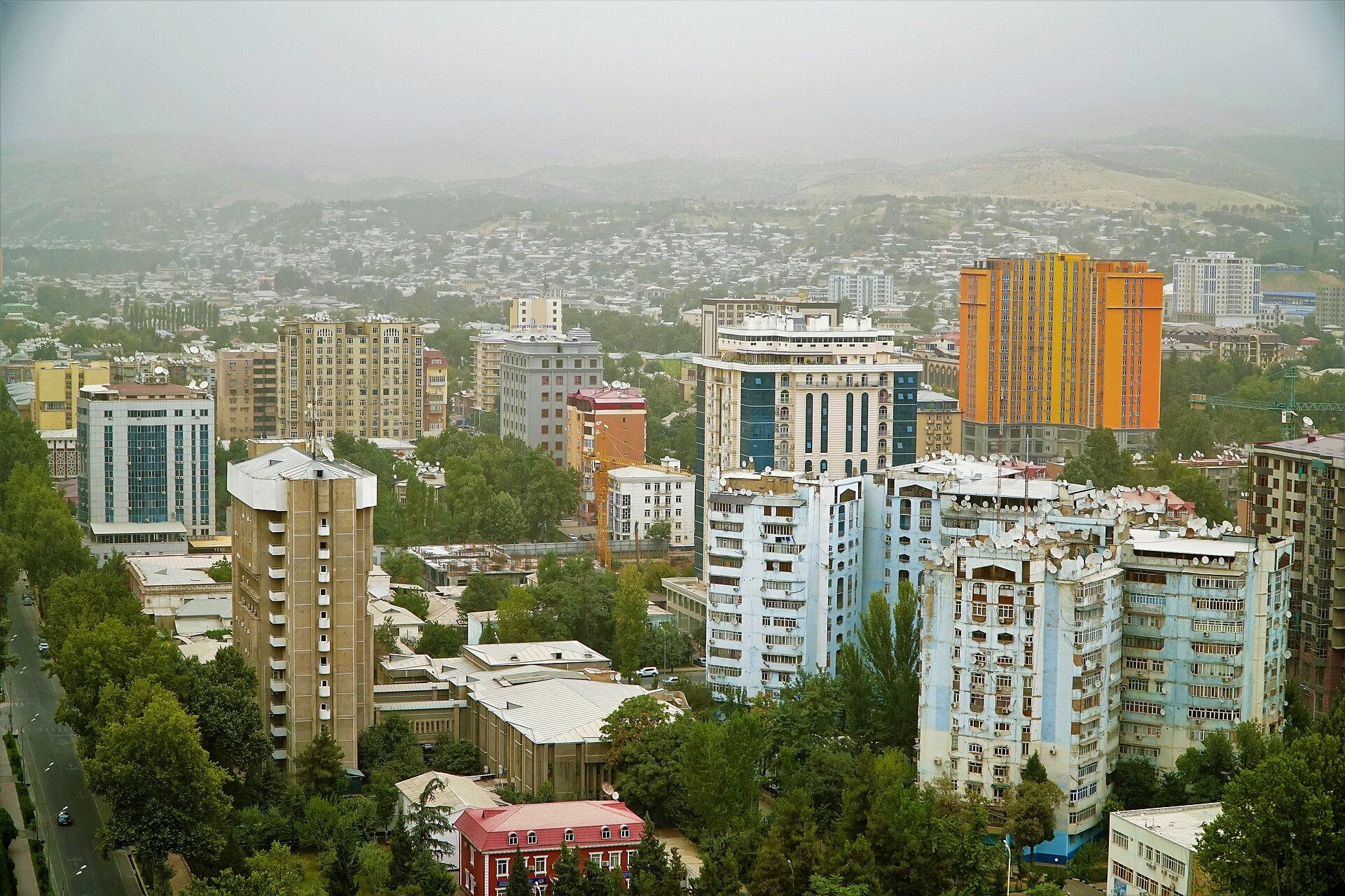 The skyline of Dushanbe, the capital, ringed by mountains. Its name means Monday, after the market day of the village from which it grew, and it has been rebuilt with broad avenues and monuments to the nation.