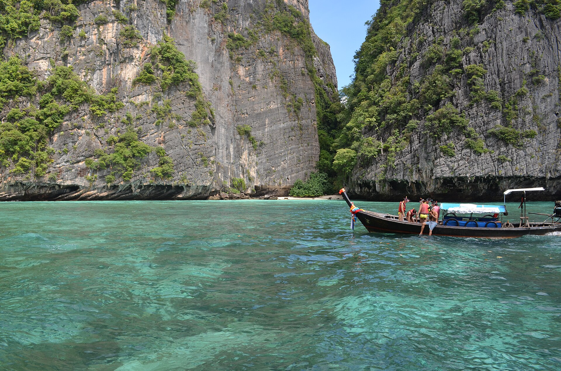 The limestone cliffs and turquoise waters of the Phi Phi Islands, among the tropical landscapes that draw visitors to Thailand.