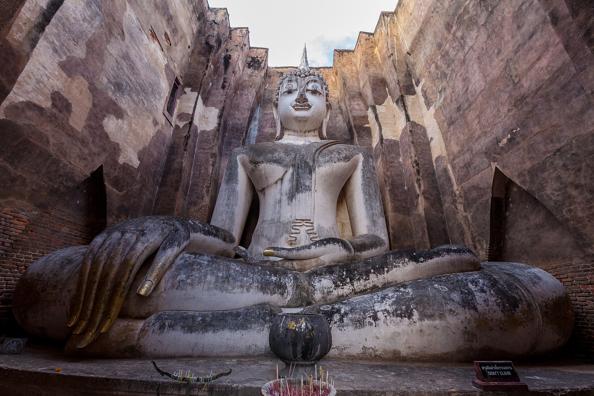 A great seated Buddha at Sukhothai; Theravada Buddhism is central to Thai life and identity. Credit: This Photo was taken by Supanut Arunoprayote. Feel free to use any of my images, but please mention me as the author and may send me a message. (สามารถใช้ภาพได้อิสระ แต่กรุณาใส่เครดิตผู้ถ่ายและอาจส่งข้อความบอกกล่าวด้วย) Please do not upload an updated image here without consultation with the Author. The author would like to make corrections only at his own source. This ensures that the changes are preserved.Please if you think that any changes should be required, please inform the author.Otherwise you can upload a new image with a new name. Please use one of the templates derivative or extract. (CC BY 4.0).