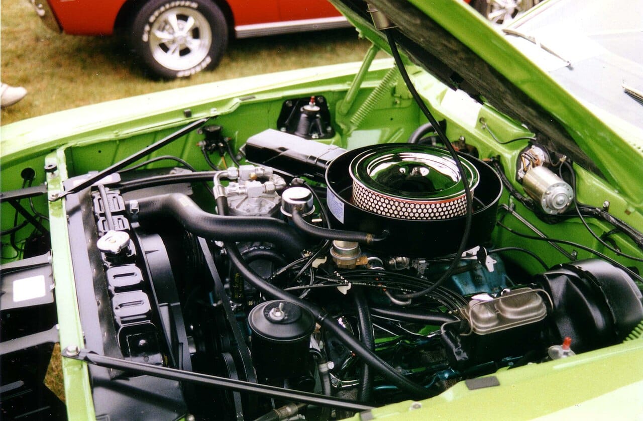 A vehicle engine. Around a billion and a half road vehicles are in use, the overwhelming majority powered this way.