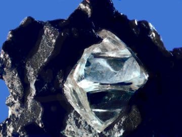 A rough diamond. Where a mineral or fuel is found is determined by which processes acted on the rock, so the cycle is the framework for locating resources.