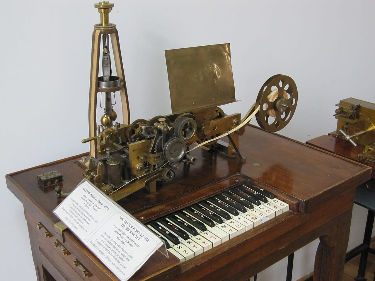 A printing telegraph. Machines that produced readable text at the receiving end removed the need for a skilled operator to transcribe, and led directly to the teleprinter.