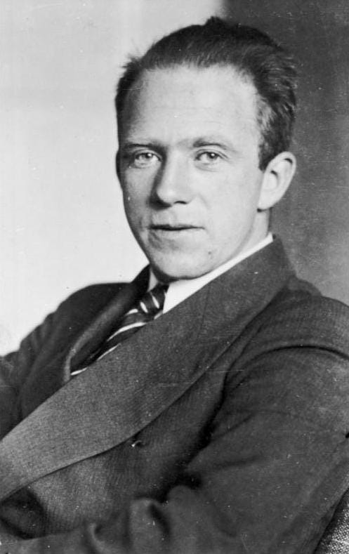 Werner Heisenberg. He derived the relation in 1927 while working in Copenhagen, at the age of twenty five.