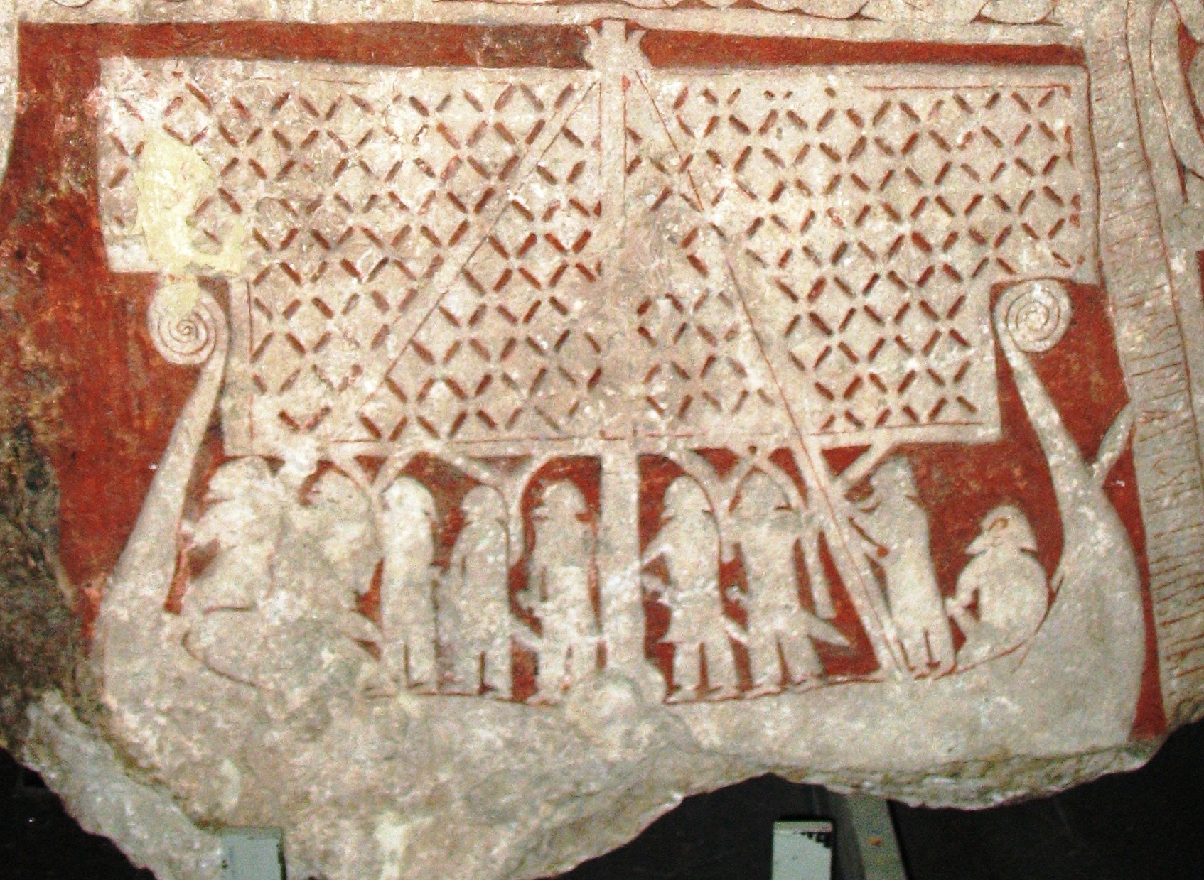 A Viking image stone depicting the longship, the vessel that carried Norse raiders and traders.