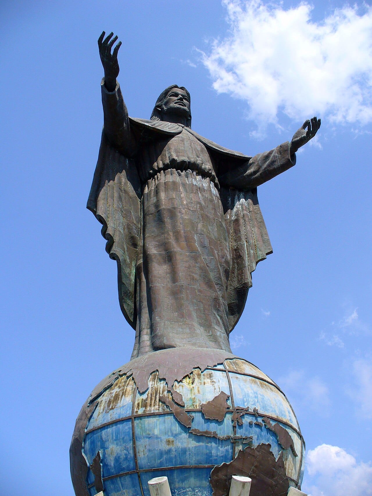 The statue of Cristo Rei on a headland above Dili, a towering figure of Christ overlooking the sea. It reflects the deep Catholic faith of Timor-Leste, one of only two Catholic-majority nations in Asia.