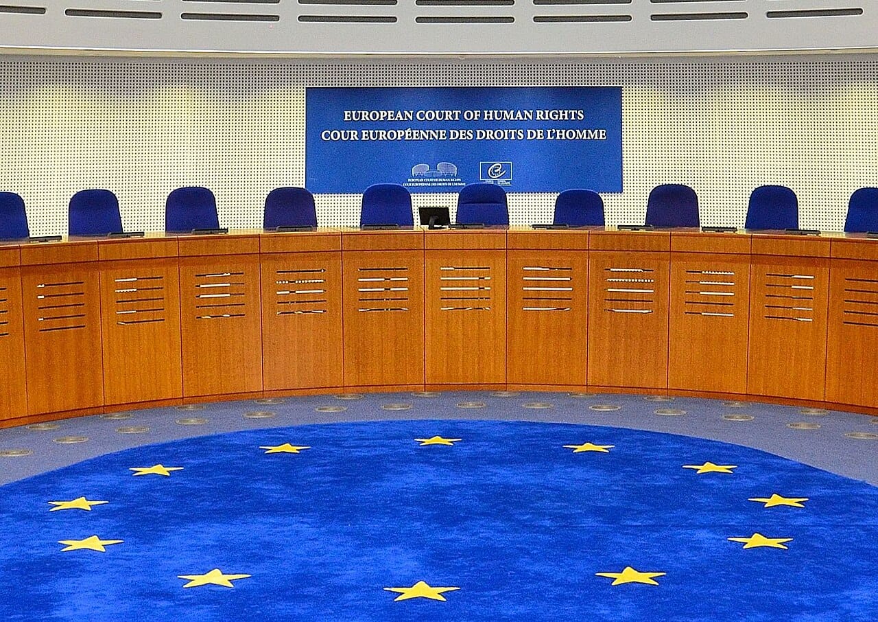 A modern courtroom without a jury box. Most of the world's legal systems decide facts through professional judges, sometimes sitting with lay assessors.