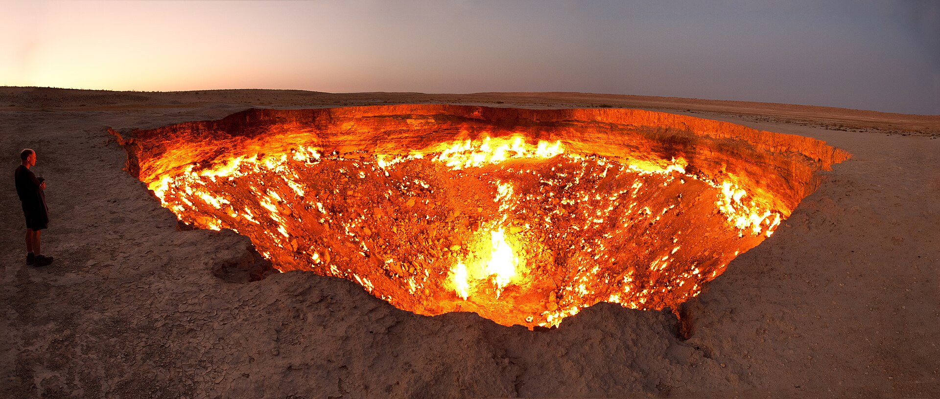 The Darvaza gas crater in the heart of the Karakum Desert, a fiery pit burning for decades after a drilling site collapsed and its gas was set alight. Known as the Door to Hell, it is one of the country's strangest sights.