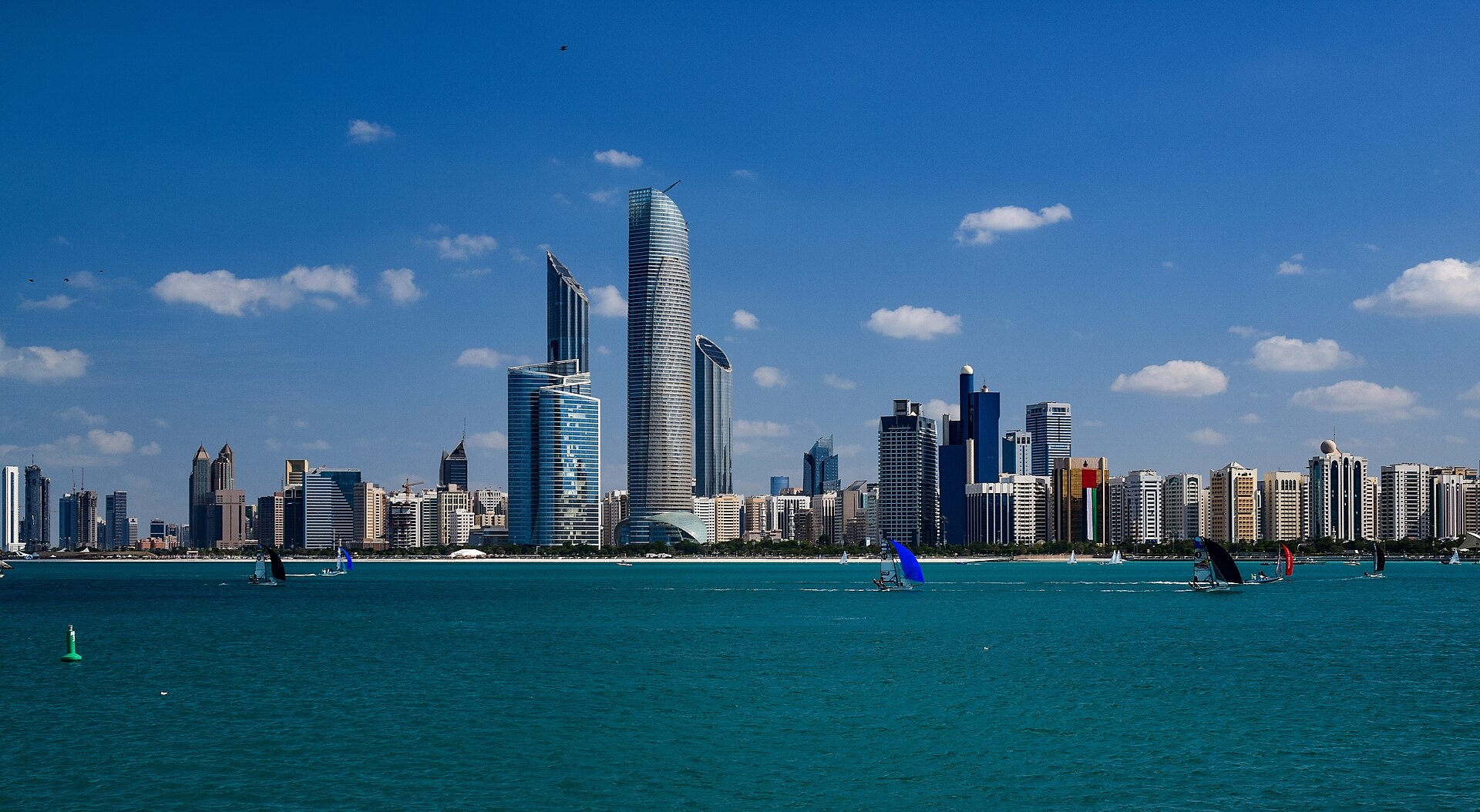 The skyline of Abu Dhabi, the capital of the United Arab Emirates and seat of its federal government. As the largest and wealthiest of the seven emirates, Abu Dhabi holds the presidency and much of the country's oil wealth.