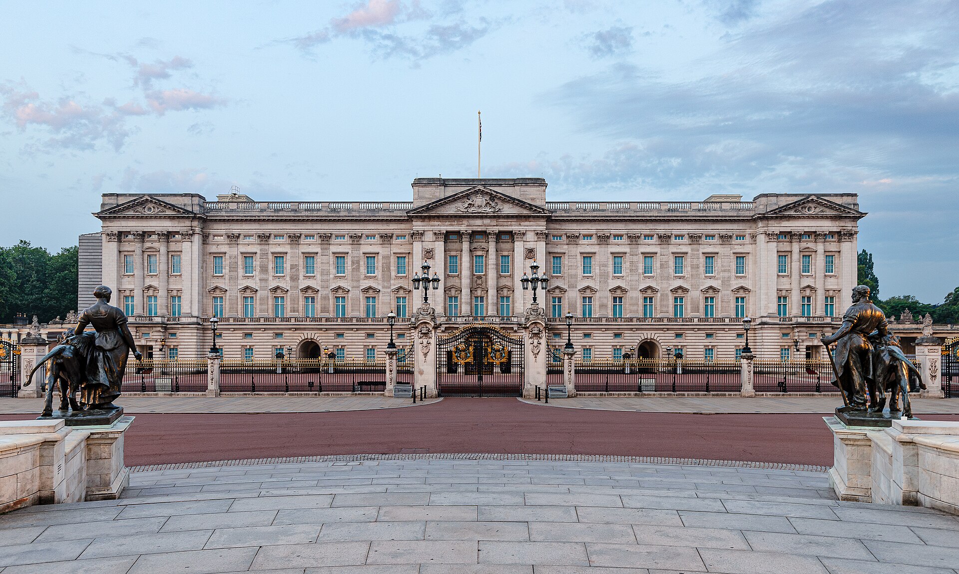 Buckingham Palace, the London home of the British monarch since 1837. The crown is now largely ceremonial, a constitutional symbol standing above the elected government.