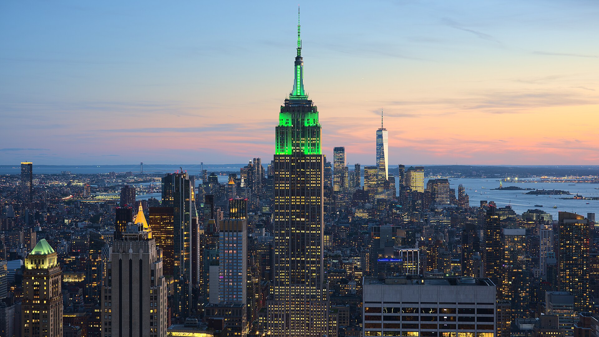 The skyline of New York City. The financial capital of the United States and home to Wall Street, it has long been the gateway and the symbol of a nation built by immigration.
