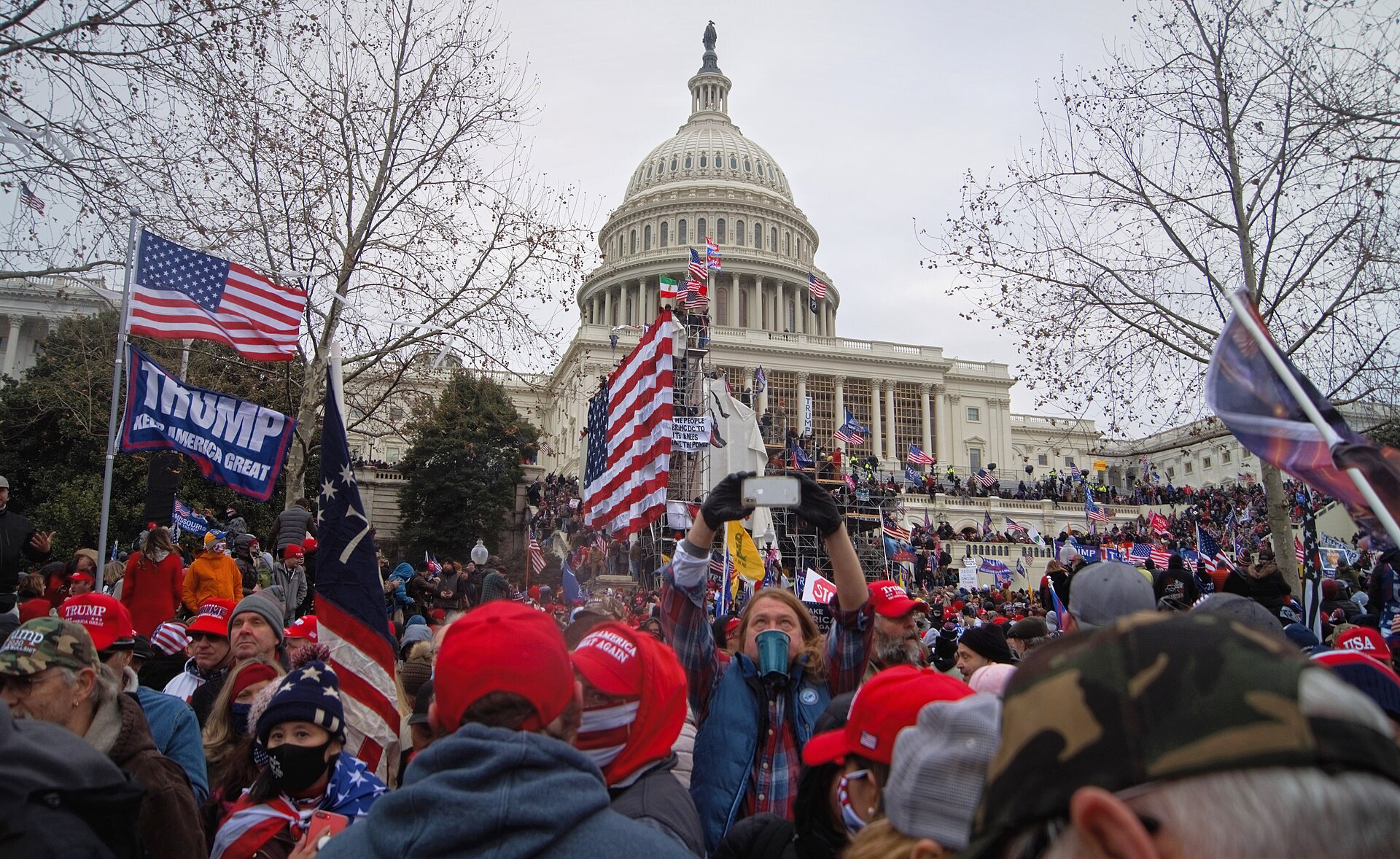 Rioters at the United States Capitol on 6 January 2021. A mob stormed Congress in an attempt to overturn the presidential election, an assault that sharpened fears about the strength of American democracy.