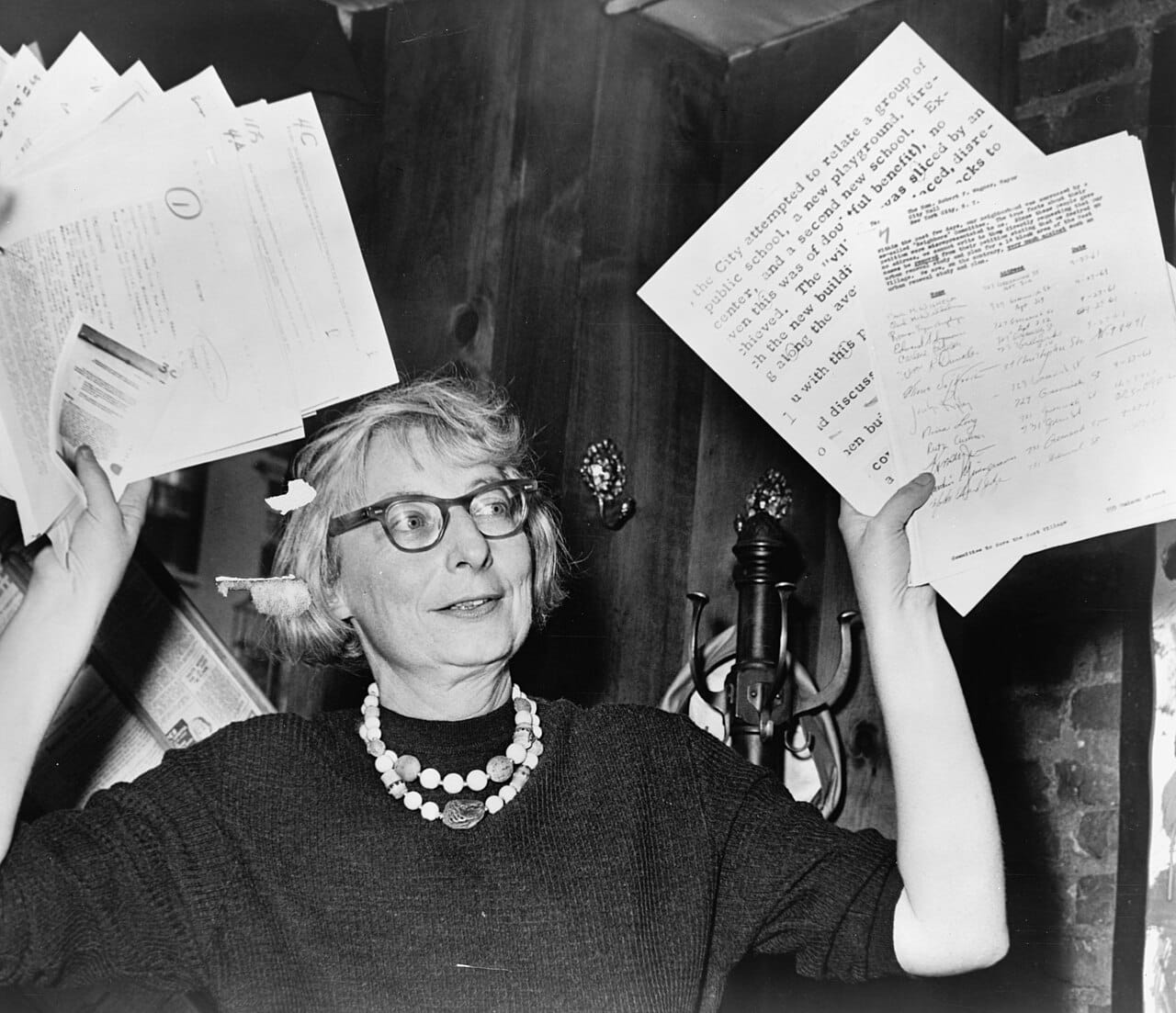 Jane Jacobs, whose 1961 book argued from observation that dense mixed-use streets produced safety and vitality, and whose organising defeated the proposed expressway through lower Manhattan.