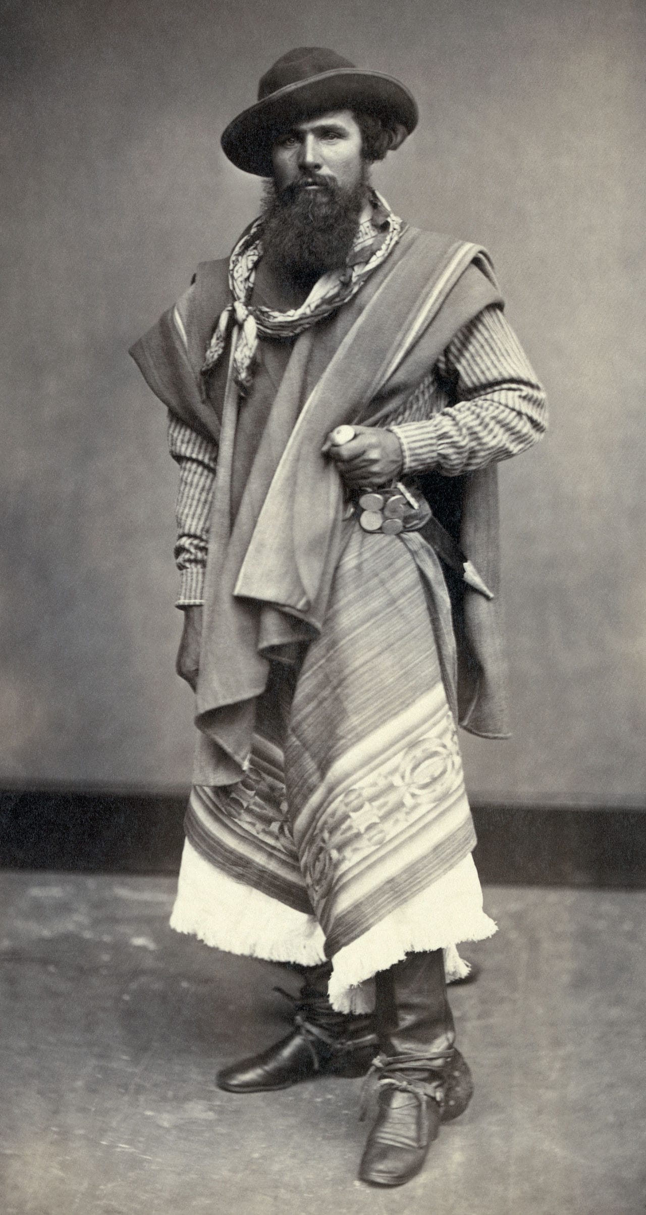A gaucho photographed in 1868. The horsemen of the Río de la Plata grasslands, skilled with lasso and knife and famously unwilling to be governed, became the central figure of Uruguayan and Argentine national imagery long after the open range was fenced.