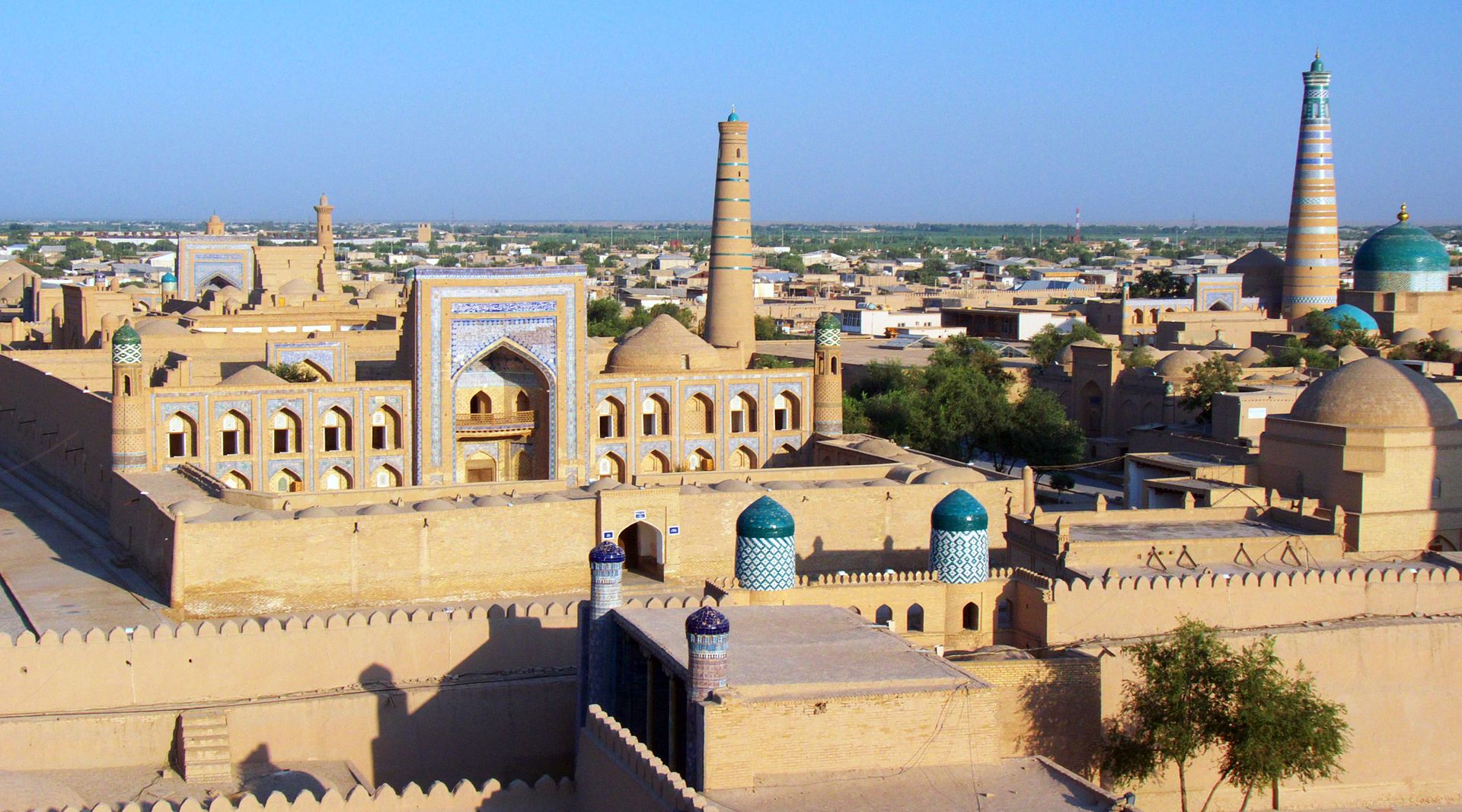 The old walled city of Khiva, seen from its ramparts. Its remarkably preserved core of mosques, minarets, and mud-brick houses makes it one of the most complete surviving cities of the old Silk Road.