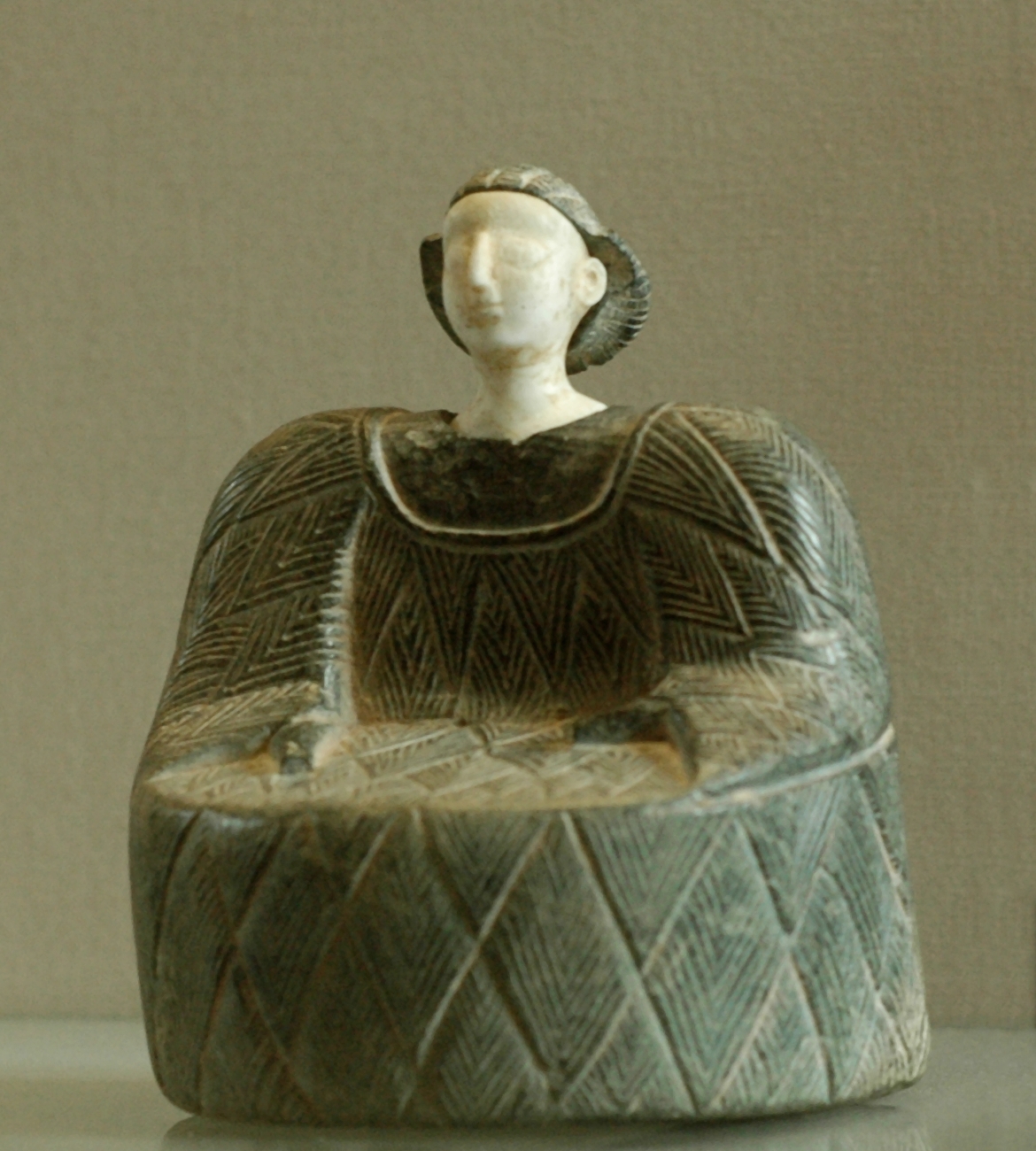 An ancient statuette of a woman in a fleecy kaunakes garment, from Bactria in what is now Uzbekistan. Such objects reflect the wealthy settled civilisations that arose between the region's two great rivers thousands of years ago.