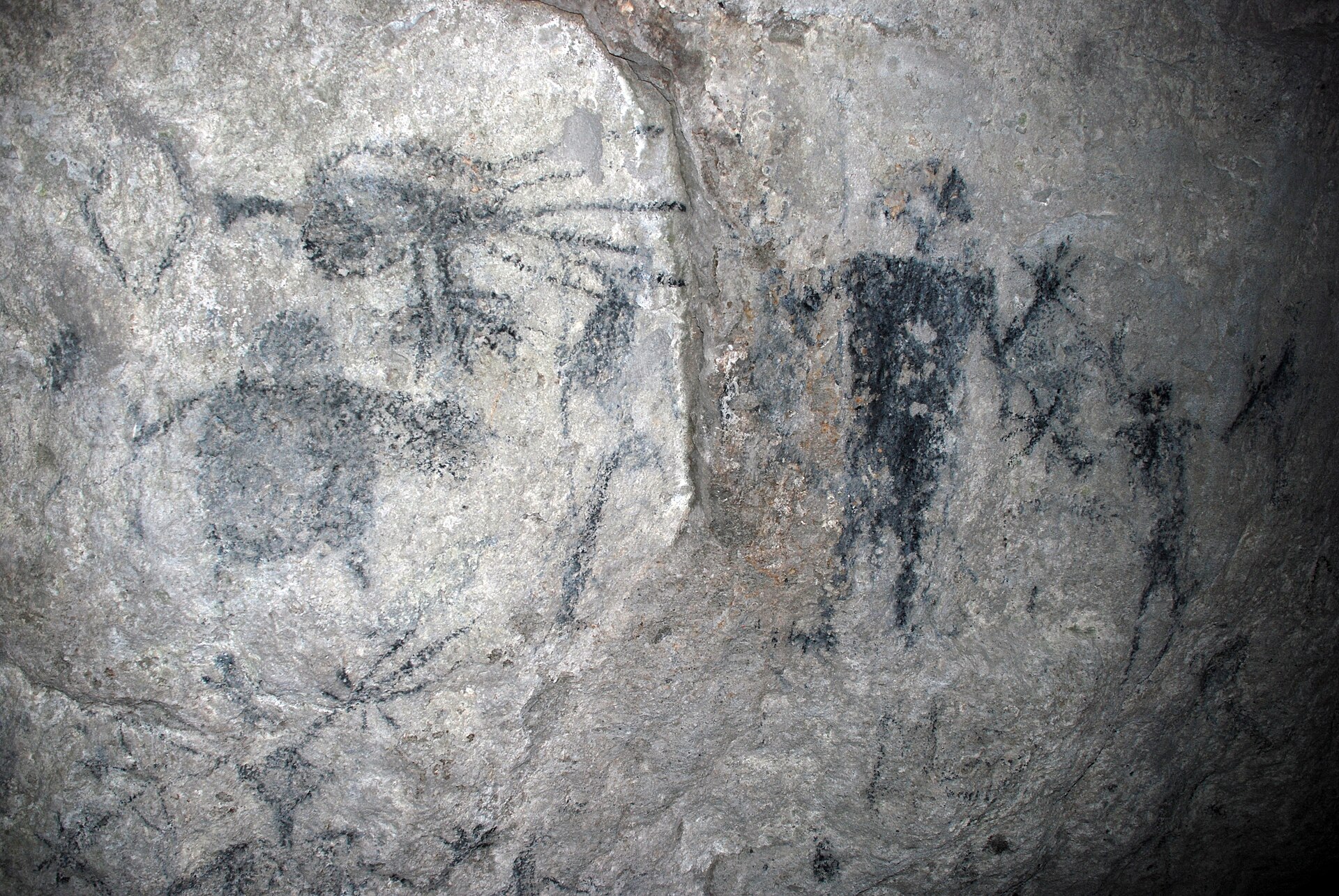 Ancient rock drawings in a cave in Vanuatu, left by the islands' early inhabitants. Melanesian peoples have lived across this scattered archipelago for some three thousand years, developing a remarkable diversity of languages and custom.