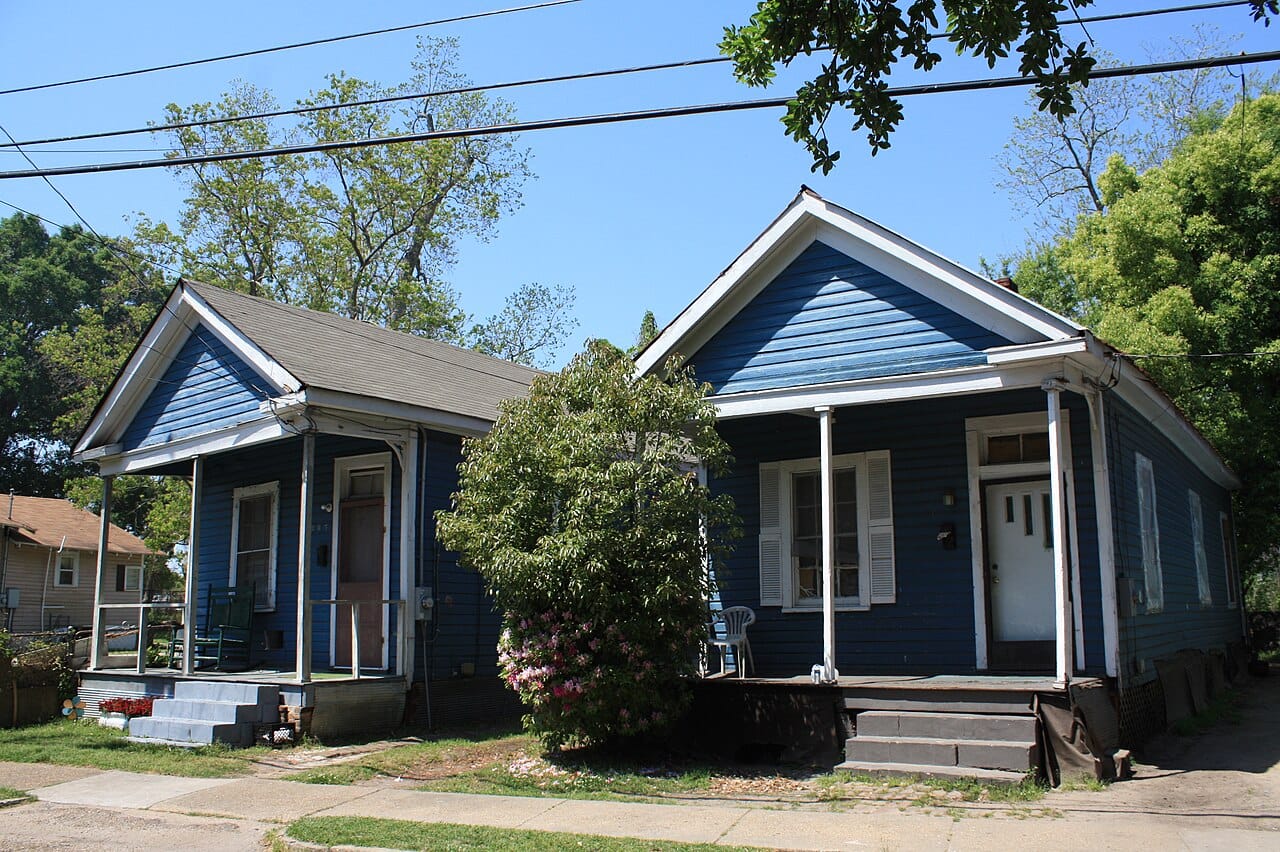 A settlement laid out around shared open ground. Vernacular plans record how households relate to one another as directly as they record climate.