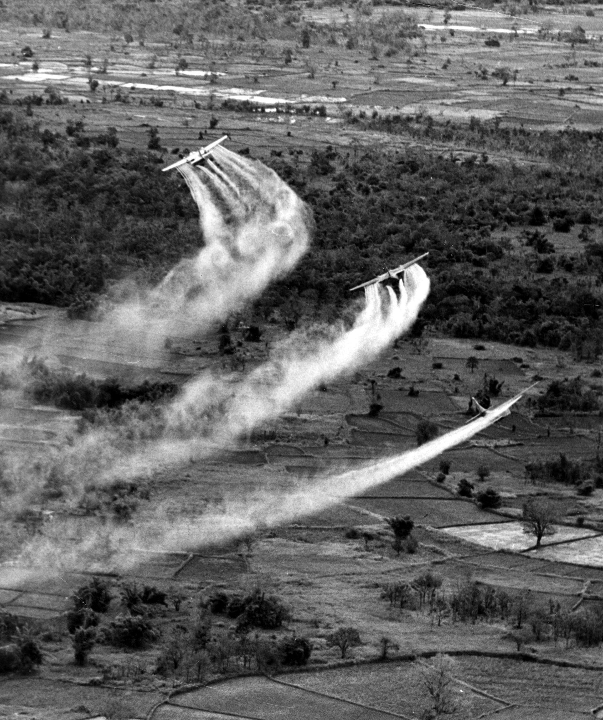 US aircraft spraying defoliant during the Vietnam War, whose toxic legacy lingered for decades. Credit: USAF (Public domain).