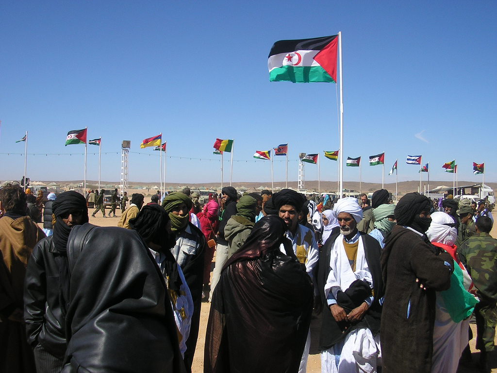 A Sahrawi commemoration of the declaration of the Sahrawi Arab Democratic Republic. The SADR is recognised by a number of states and is a full member of the African Union, which Morocco left in 1984 over its admission and rejoined in 2017.