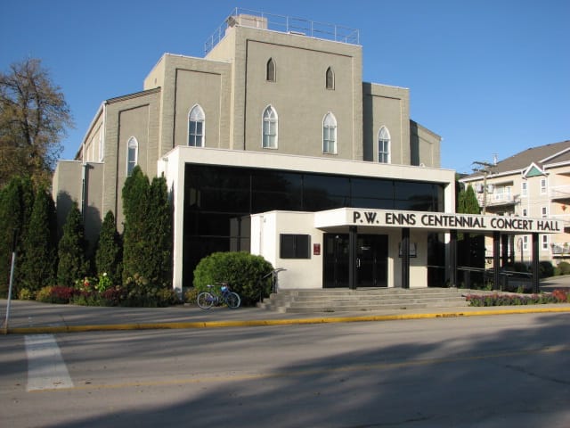 The P. W. Enns Centennial Concert Hall. The city's arts venues are named for local families whose businesses funded them, a pattern common across the Mennonite southwest.