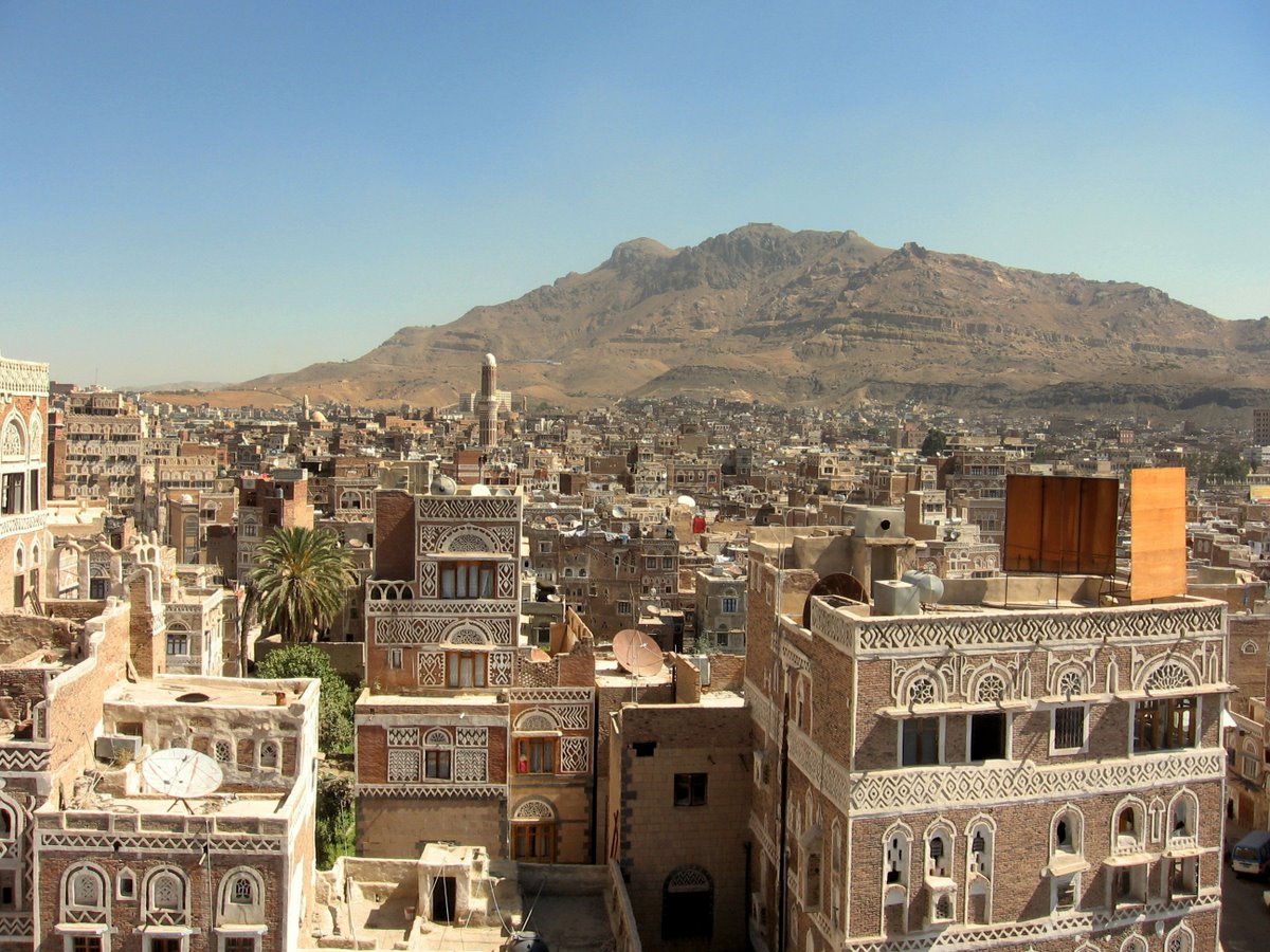 The old city of Sanaa, one of the oldest continuously inhabited cities on Earth, its tower houses built of mud brick and stone and decorated with white geometric patterns. The distinctive skyline has made it a symbol of Yemeni heritage.
