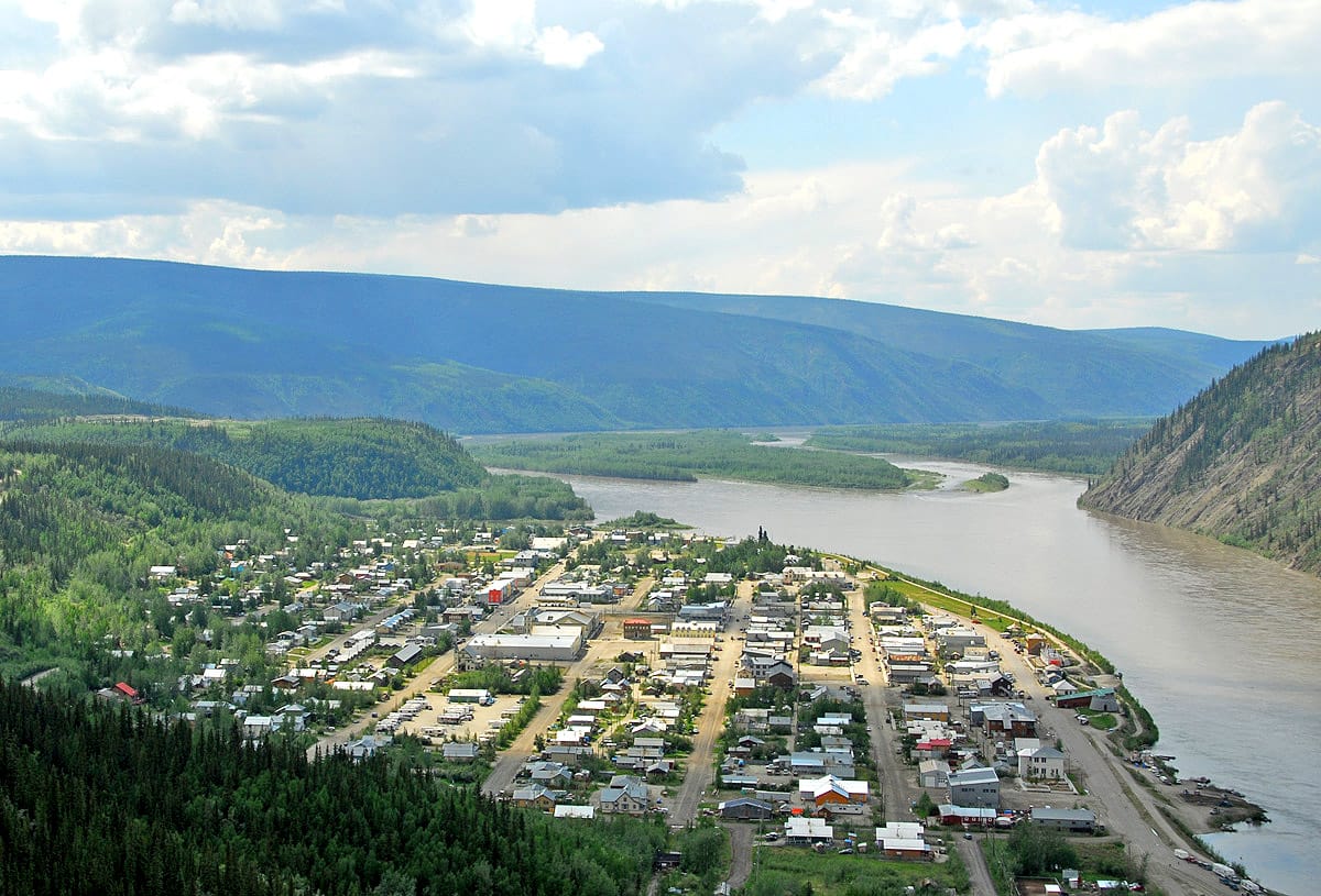 Dawson City on the Yukon River, the boomtown at the heart of the Klondike Gold Rush. Its brief, wild heyday around 1898 made it one of the largest towns in the Canadian northwest before the gold ran out.